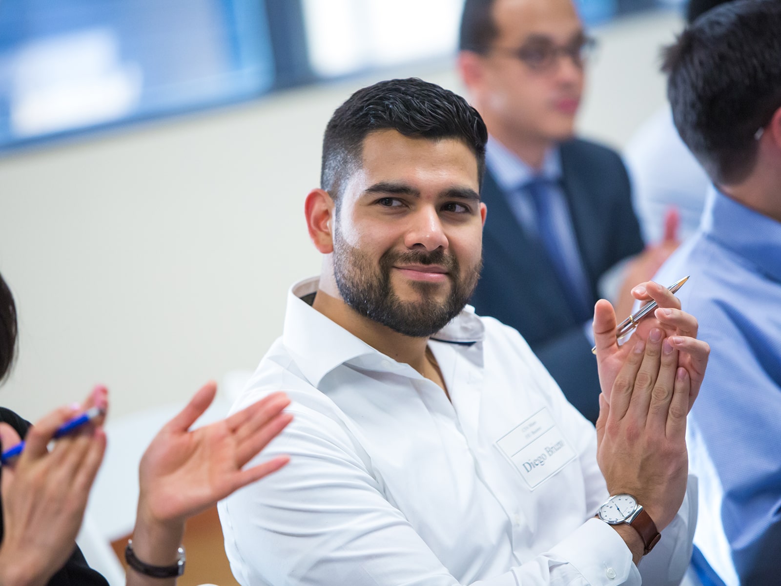 FIU Business student presenting in a lab