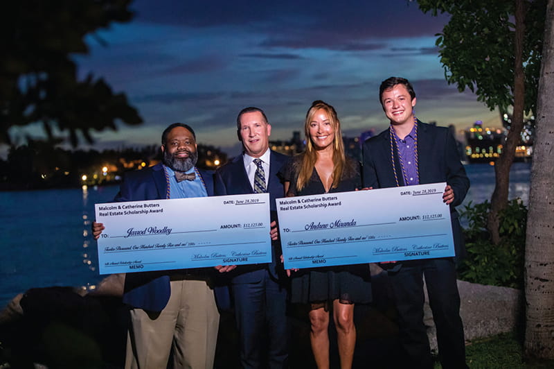Malcolm Butters, president and co-founder, Butters Construction and Development, and his wife Catherine with 2019 Master of Science in International Real Estate program graduates Jarrod Woodley and Andrew Miranda, who were awarded Butters Real Estate Scholarships.