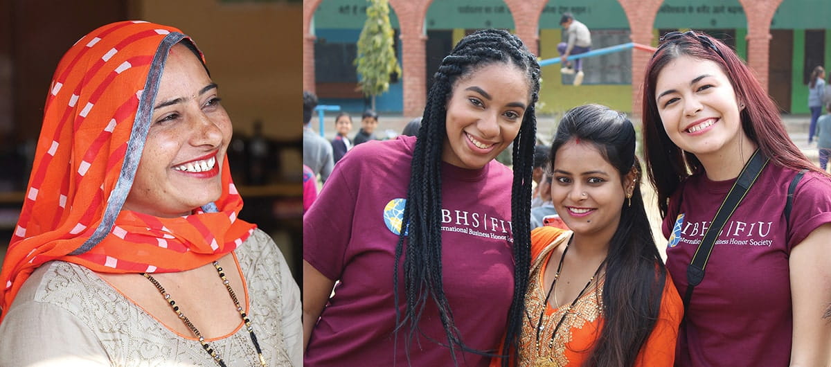 IBHS students Arliany Sapulis (L) and Jeniffer Soler mingle with a teacher at the local primary school.