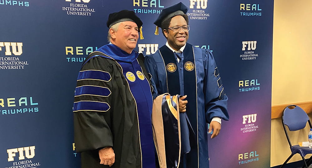 (L to R) George Marakas (PhD ’95), associate dean, research and doctoral studies, with DBA program graduate Claude Kershner IV (DBA ’22), at the FIU Business summer commencement ceremony on July 31, 2022.