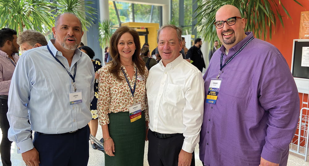 (L to R) Lorenzo Perez Jr. (MSIRE ’07), executive director, Premier International Properties; Jennifer Forbes, principal/broker, Commercial TeamMates; William Hardin, dean, FIU Business; and Fernando Arencibia Jr., CEO, Arenci Properties Realty, at the Miami Association of Realtors Young Professionals Network 2022 REBarcamp on August 4, 2022.