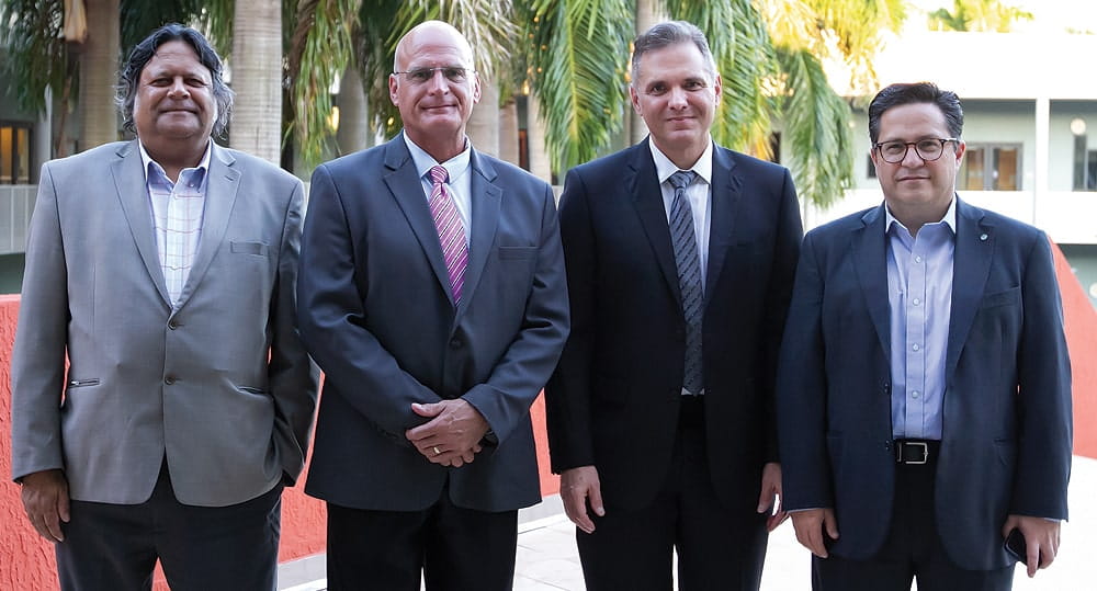 Shahid Hamid, chair, Department of Finance, FIU Business; Mike McGlone, senior commodity strategist, Bloomberg Intelligence; Flavio Carrillo, director, Capital Markets Lab, FIU Business; and Guillermo Rodriguez Gonzalez-Valadez, head of Latin America and U.S. Offshore, WisdomTree Asset Management, at the Dec. 7 presentation about the FIU Business Student Managed Investment Fund.