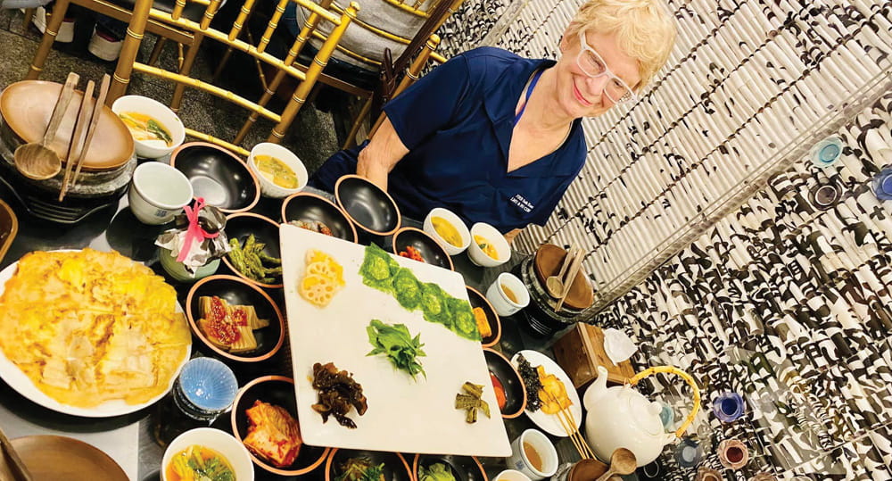 Karen Paul, professor of international business, FIU Business, enjoyed a spread of vegan Temple food with colleagues at Sanchon restaurant in the Insadong area of Seoul during the FIU Center for International Business Education and Research (CIBER) Faculty Development in International Business program in South Korea May 25, 2023 to June 3, 2023. 