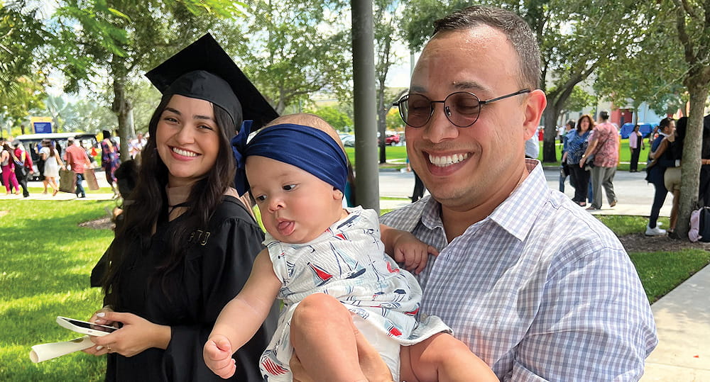 Celebrating at a summer 2023 commencement ceremony for graduate students on August 2, 2023.