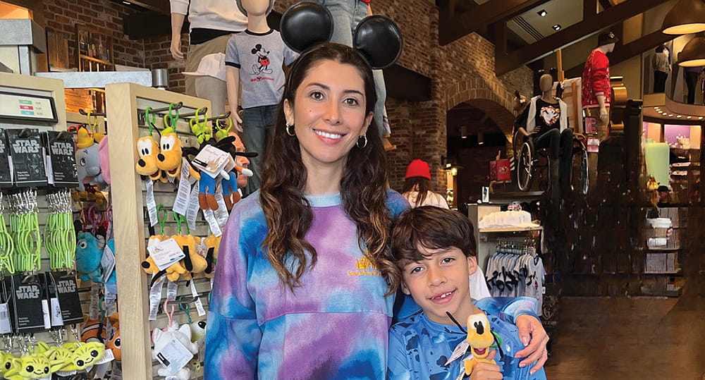 Jenny Reina, with her 8-year-old son, Mateo