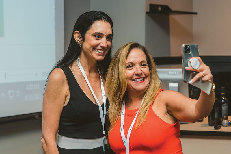 A conference participant with Stephanie Honig (left), director of communication, national sales and export, Honig Vineyard & Winery.