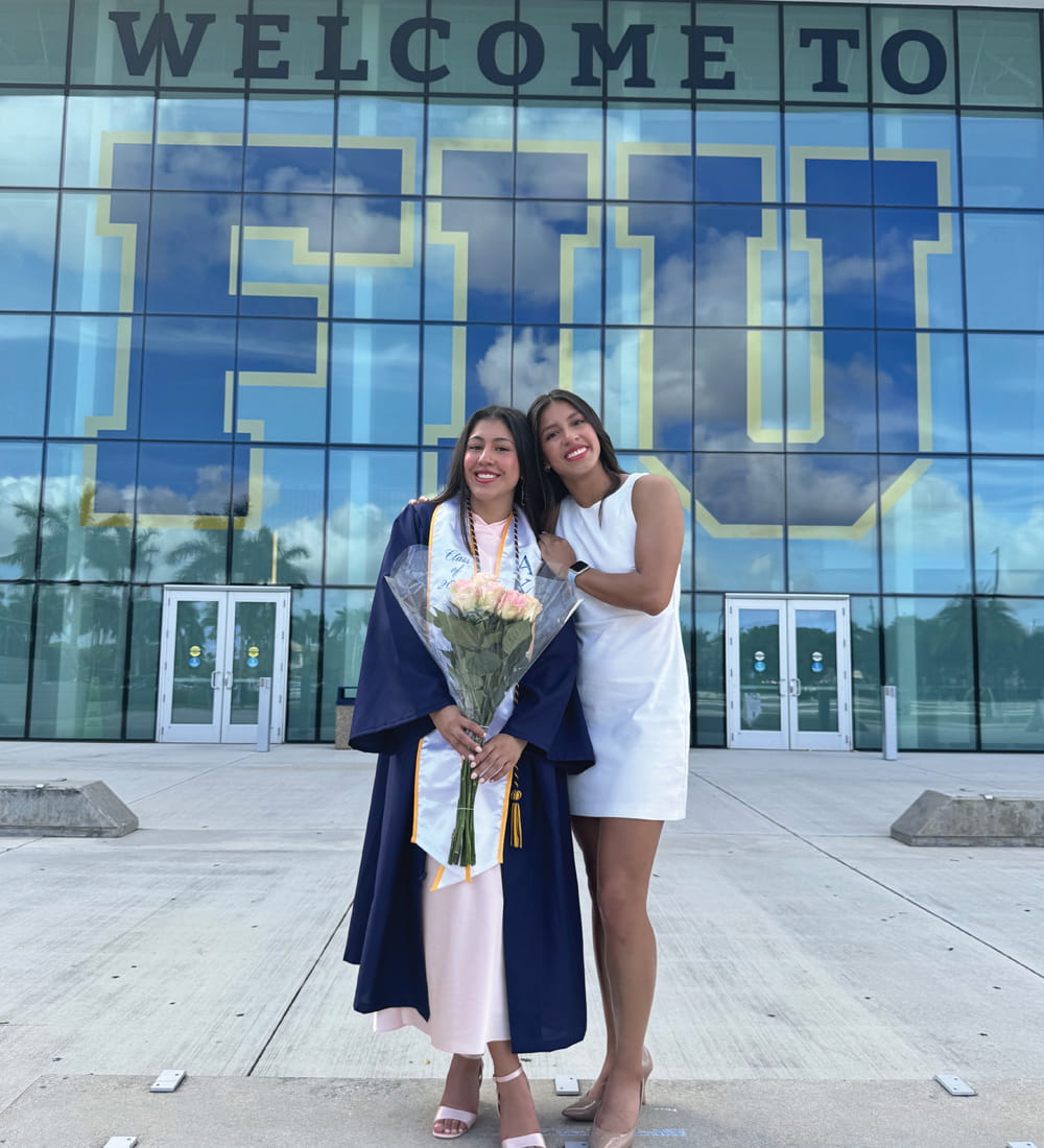 (L to R) Natalia Acosta Cevallos (BBA '24) and her sister Paulina Acosta Cevallos at the undergraduate student summer commencement ceremony on August 1, 2024.
