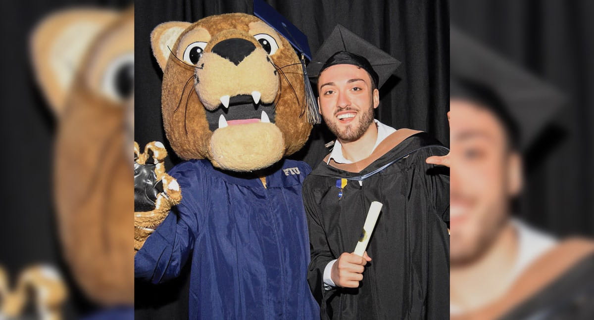Frank Luis Acosta at the graduate fall commencement ceremony on December 16, 2024.
