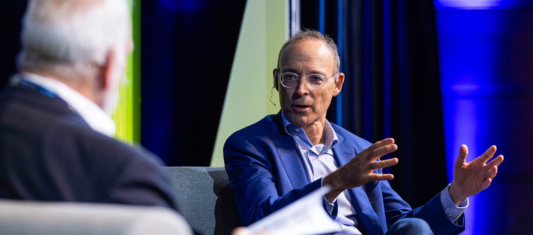 Miki Naftali, CEO and founder of the Naftali Group, in a fireside chat with Clay Dickinson, professor of real estate, during REact 2025.