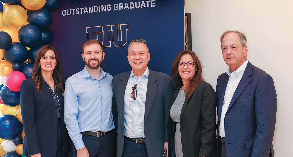 Jeanette M. Nuñez, president, FIU; Kaan Canayaz, one of FIU's Outstanding Graduates for summer 2025; Jae Hoon Lee, doctoral director, marketing and logistics, FIU Business; Elizabeth M. Béjar, provost, executive vice president and chief operating officer, FIU; and William Hardin, dean, FIU Business, at the awards ceremony in April 2025.