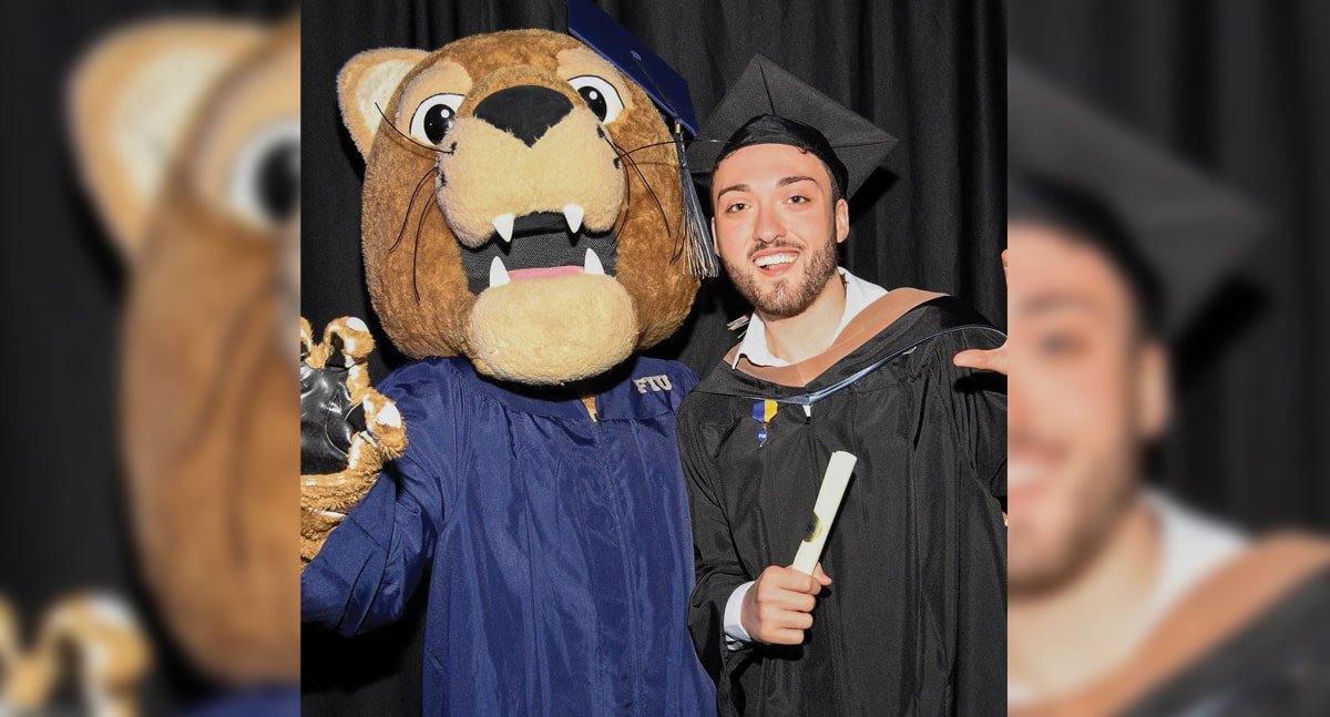 Frank Luis Acosta at the graduate fall commencement ceremony on December 16, 2024.