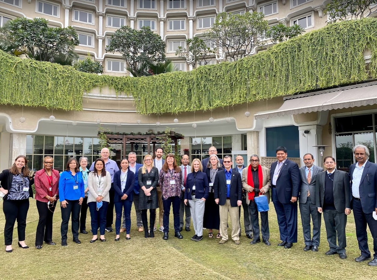 The group poses at their hotel, The Taj Palace in Delhi after the CII (Confederation of Indian Industry) Seminar: “India-Headed towards a US$5 trillion Economy.” They are joined by the seminar speakers.