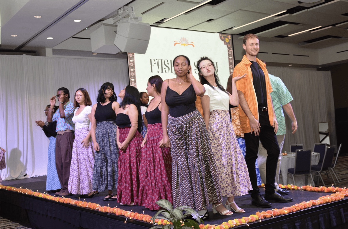 Models walk the runway in handmade skirts and shirts at the Bandhwari Women’s Project fashion show