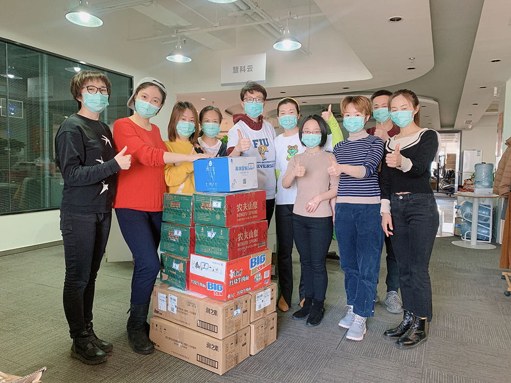 Huike Group team members In Beijing prepare shipment of masks for South Florida hospitals.