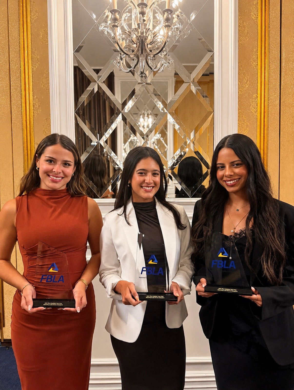 Marketing students Melanie Garcia, Daniella Padron and Helen Pena.
