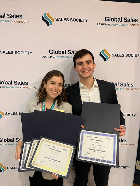 Sofia Reyes with David Claramunt, from Florida State University, winner of the Spanish-language round