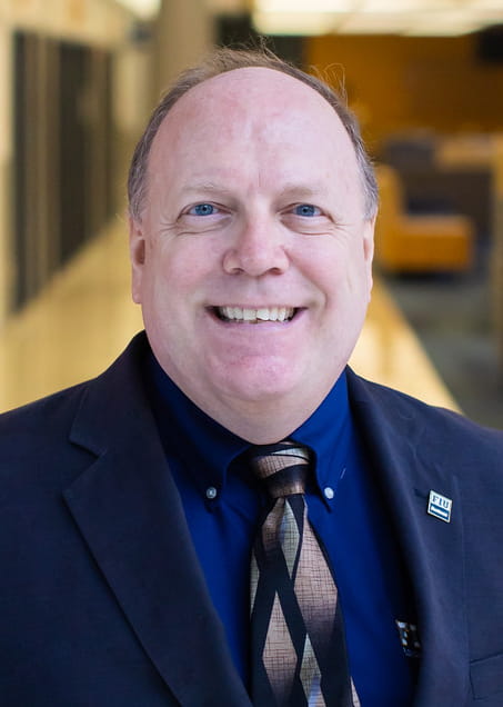 Headshot of Professor William Newburry