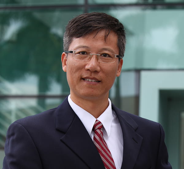 Headshot of Professor Xiaoquan Jiang